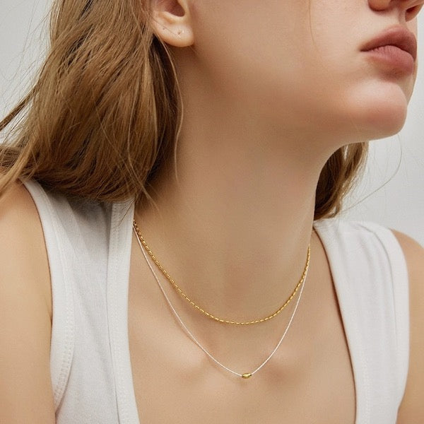 Stacked necklaces top