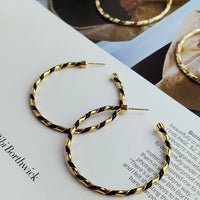  hoop earrings with braided leather