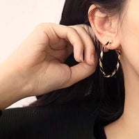  hoop earrings with braided leather