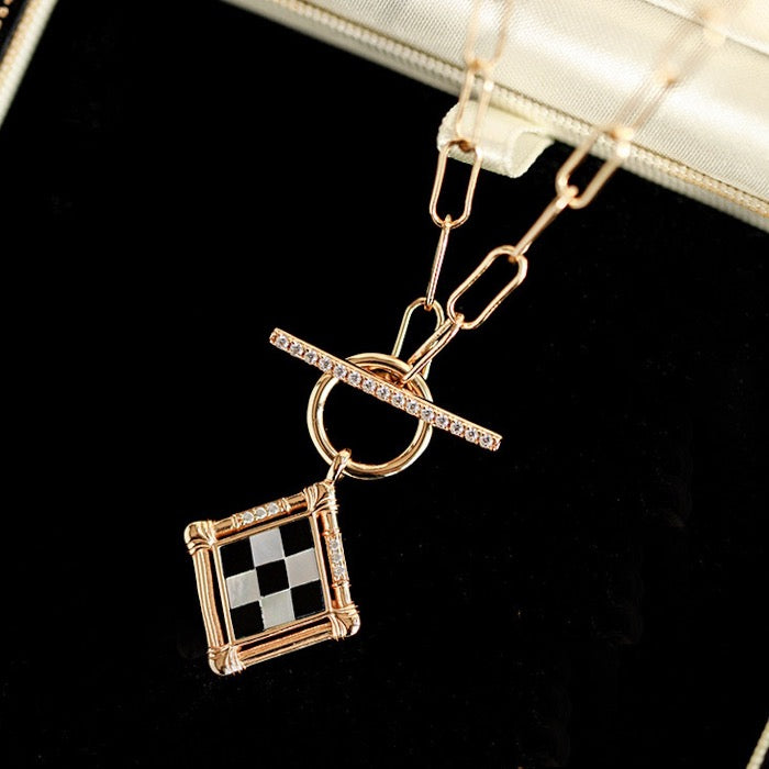 Vintage look check board necklace